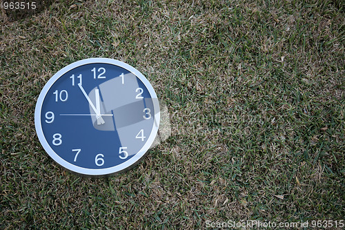 Image of Wall clock in the grass