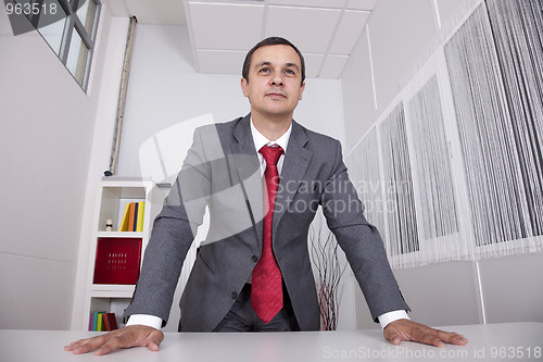 Image of Powerful businessman at the office