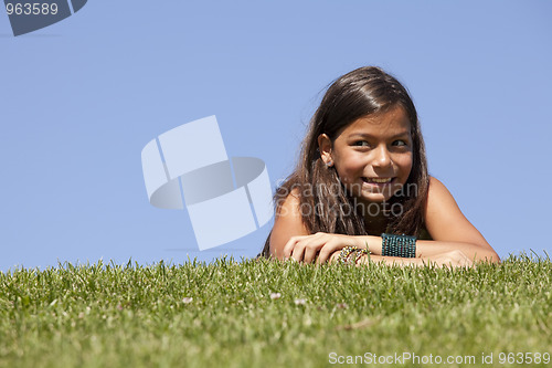 Image of young child on the grass