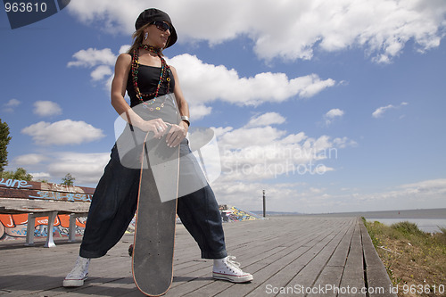 Image of cool skateboard woman