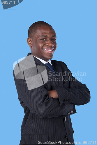 Image of African businessman smiling to you