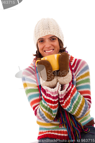 Image of happy woman holding a cup 