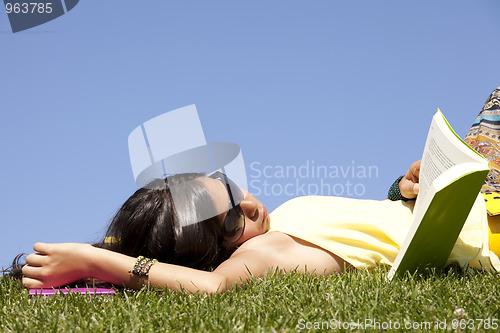 Image of Children reading a book