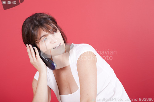 Image of Woman talking on the telephone