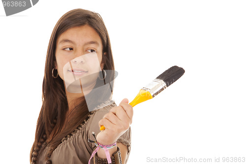 Image of Teenager holding a brush
