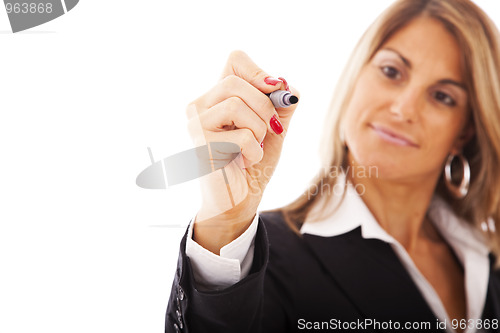 Image of businesswoman writing at the whiteboard