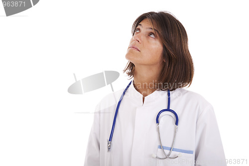 Image of woman doctor looking up