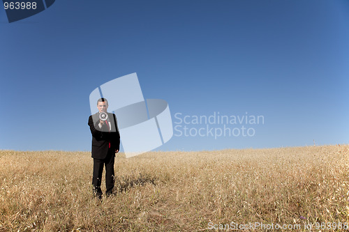 Image of Businessman shouting at the megaphone to you