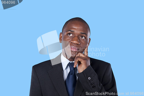 Image of African businessman thinking