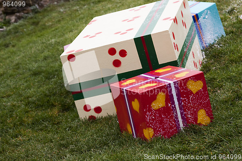 Image of Gift boxes in the grass