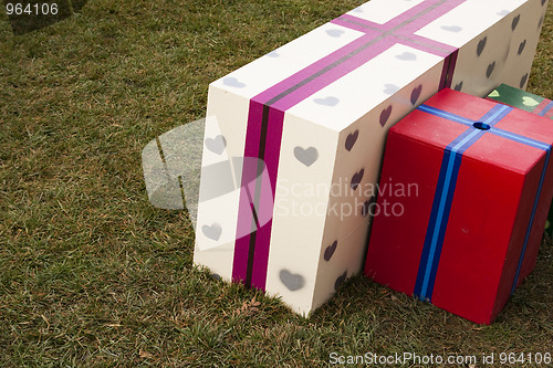 Image of Gift boxes in the grass