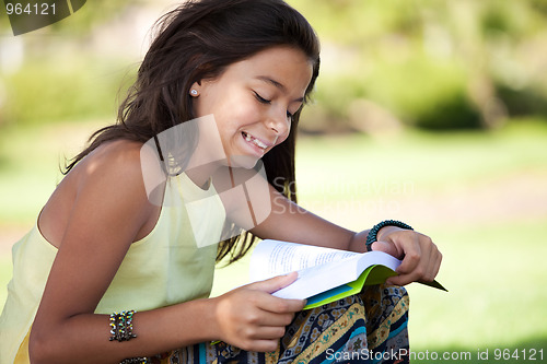 Image of Children reading a book