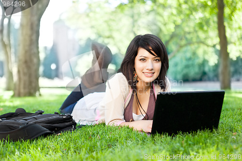 Image of Mixed race college student with laptop