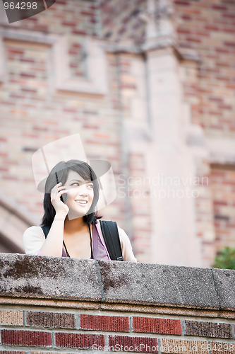 Image of Mixed race student on the phone