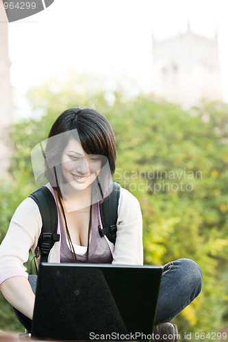 Image of Mixed race college student with laptop
