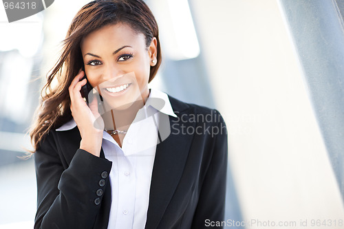 Image of Black businesswoman on the phone