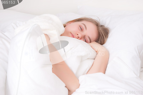 Image of woman in bed