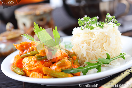 Image of Red chicken curry stripes with rice