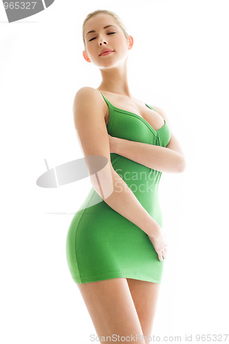 Image of young woman in green slip