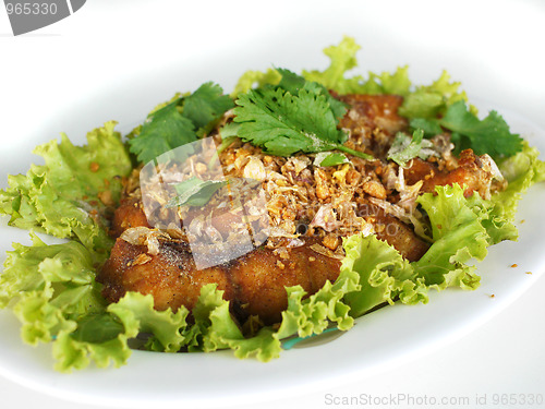 Image of Thai food, fried fish with garlic