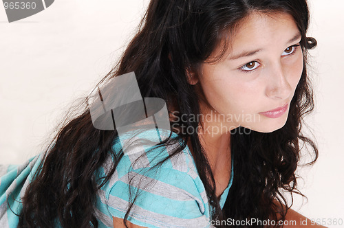 Image of Girl lying on floor.