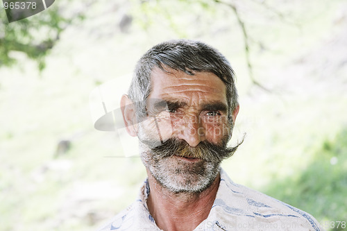 Image of Elederly man with moustaches