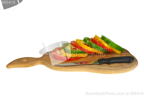 Image of Cutting board with sliced  bell pepper and knife