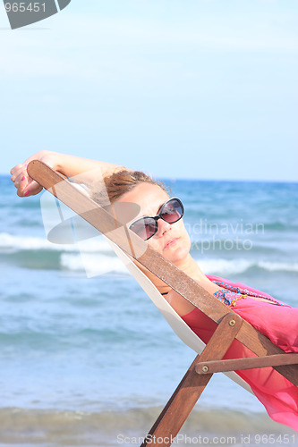 Image of sitting in chaise longue 