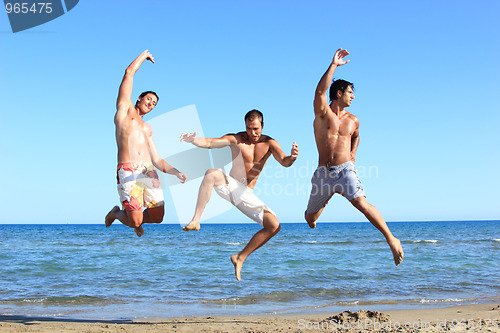 Image of Men Relaxing On the Beach