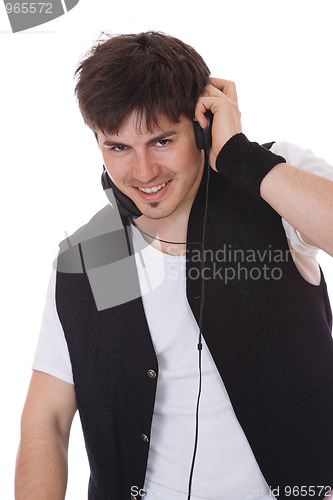 Image of Young man listening music