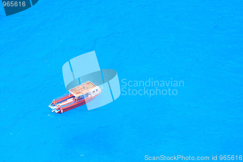 Image of boat in deep blue water