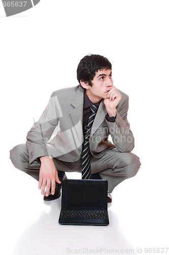 Image of Young man sitting 