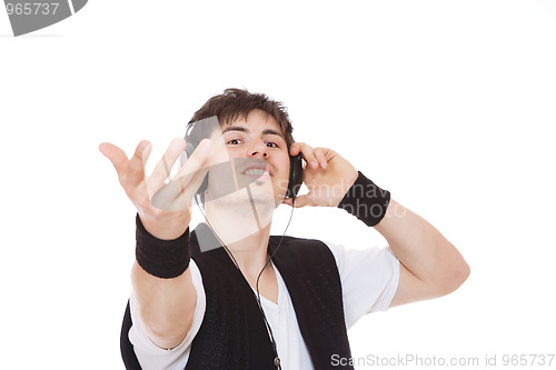 Image of Casual man listening to music