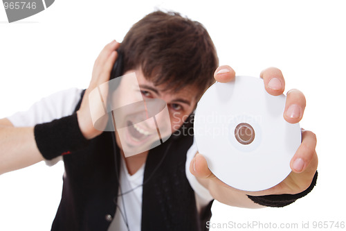 Image of Young guy holding a compact disc