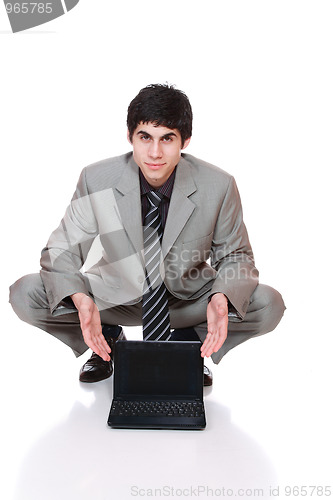 Image of Young man sitting 