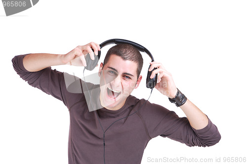 Image of Young man listening music