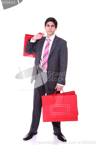 Image of handsome man with shopping bags