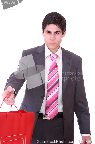 Image of young man with shopping bags 