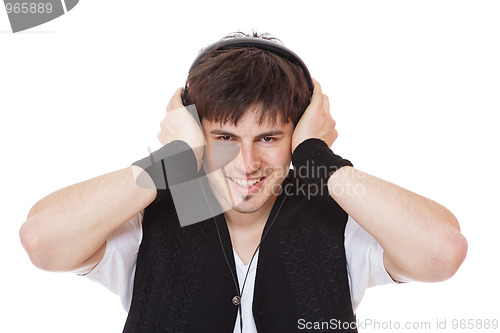 Image of Casual man listening to music