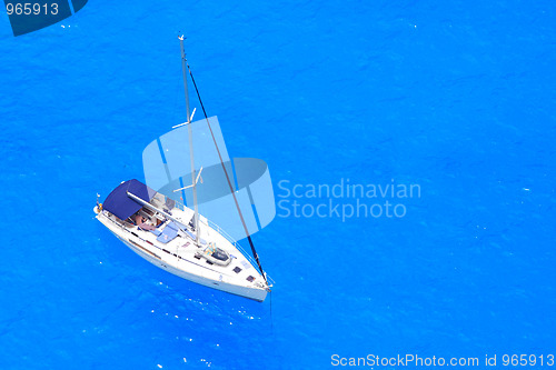 Image of boat in deep blue water