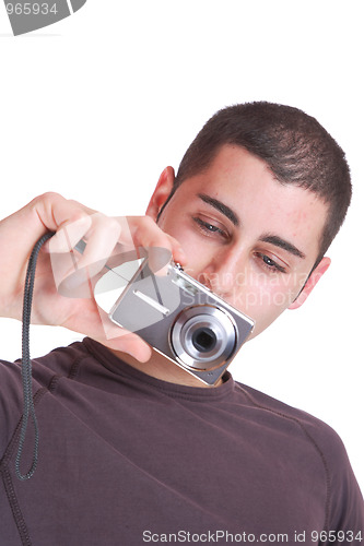 Image of happy young casual man taking pictures