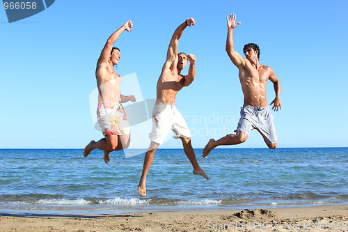 Image of Men Relaxing On the Beach