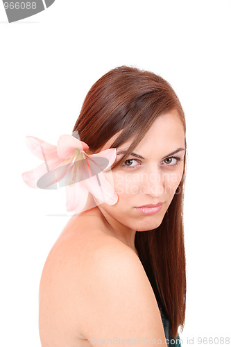 Image of Beautiful woman with flower