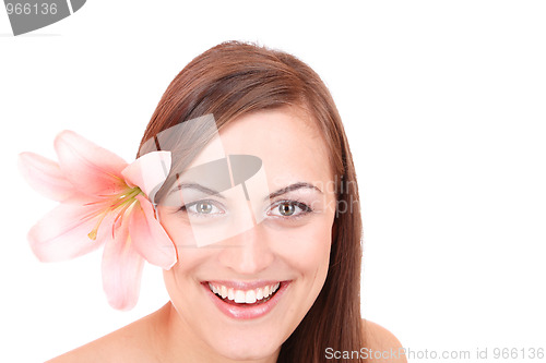 Image of Beautiful woman with flower