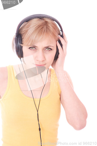 Image of Woman with headphones listening to music