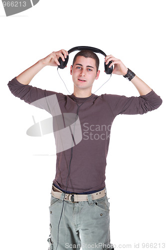 Image of Young man listening music