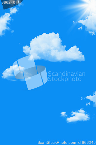 Image of Blue sky and white clouds with sunny rays