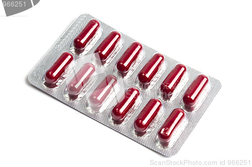 Image of Red capsules packed in blister