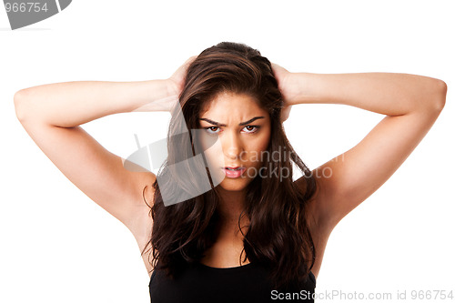 Image of Mad woman holding head