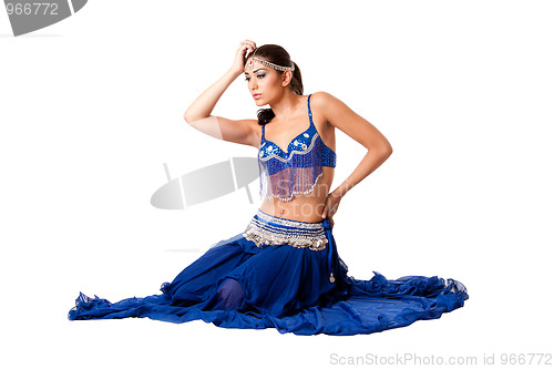 Image of Belly dancer sitting in blue dress